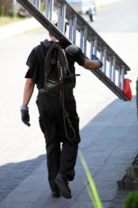 man carry ladder on right shoulder
